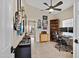 Bright home office featuring multiple guitars, modern tile flooring, and a ceiling fan for added comfort at 4131 E Cascalote Dr, Cave Creek, AZ 85331