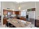 Updated kitchen featuring granite countertops, stainless steel appliances, and abundant cabinetry at 4131 E Cascalote Dr, Cave Creek, AZ 85331