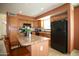 Bright kitchen with ample counter space, black appliances, and a functional design at 44865 W Woody Rd, Maricopa, AZ 85139