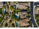 An aerial view showcases multiple houses, each with its own private pool and meticulously landscaped backyard oasis at 5434 E Barwick Dr, Cave Creek, AZ 85331