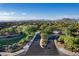 Community aerial view showcasing the landscape, streets, houses, and distant mountains at 5434 E Barwick Dr, Cave Creek, AZ 85331