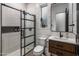 Modern bathroom with walk-in shower, stylish vanity, and shiplap walls at 5434 E Barwick Dr, Cave Creek, AZ 85331