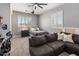 Bedroom with grey walls, carpet, sectional and shutters at 5434 E Barwick Dr, Cave Creek, AZ 85331