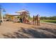 Community playground with slides, climbing structures and sun shades providing fun for all ages at 5434 E Barwick Dr, Cave Creek, AZ 85331