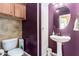 Well-maintained half-bathroom has pedestal sink at 5707 N Kristi Ln, Litchfield Park, AZ 85340