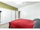Bedroom with a bed and slider closet at 5707 N Kristi Ln, Litchfield Park, AZ 85340