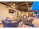 Inviting backyard features a cozy covered patio with stylish furniture, creating an ideal outdoor living space at 603 W Keats Ave, Mesa, AZ 85210
