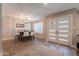 Elegant dining room featuring a modern chandelier and stylish furnishings at 603 W Keats Ave, Mesa, AZ 85210