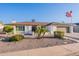 Charming single-story home featuring a landscaped front yard and an American flag at 603 W Keats Ave, Mesa, AZ 85210