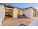 Inviting front porch with seating, modern door, and decorative details for enhanced curb appeal at 603 W Keats Ave, Mesa, AZ 85210