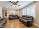 Open living room with a modern fireplace and comfortable leather seating at 603 W Keats Ave, Mesa, AZ 85210