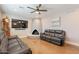 Cozy living room with a stylish fireplace and comfortable leather seating at 603 W Keats Ave, Mesa, AZ 85210