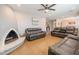 Inviting living room with a cozy fireplace and comfortable leather seating at 603 W Keats Ave, Mesa, AZ 85210