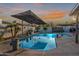 Backyard pool with two shade umbrellas at 603 W Keats Ave, Mesa, AZ 85210