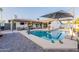 Beautiful backyard oasis with a sparkling pool and comfortable lounge seating at 603 W Keats Ave, Mesa, AZ 85210