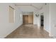 Bright bedroom boasting tile floors, custom closet and in-unit washer and dryer for convenience at 610 E Roosevelt St # 145, Phoenix, AZ 85004