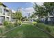 Lush green community space with manicured lawns and landscaping, creating a welcoming environment for residents at 610 E Roosevelt St # 145, Phoenix, AZ 85004