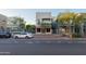 Charming multi-story commercial building featuring a red and white striped awning at 610 E Roosevelt St # 145, Phoenix, AZ 85004