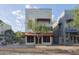 Modern multi-story commercial building with a charming red and white striped awning at 610 E Roosevelt St # 145, Phoenix, AZ 85004