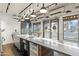 Spacious commercial kitchen with expansive countertops and street view windows at 610 E Roosevelt St # 145, Phoenix, AZ 85004