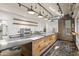 Modern commercial kitchen featuring stainless steel appliances, subway tile, and sleek countertops at 610 E Roosevelt St # 145, Phoenix, AZ 85004