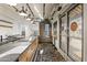 Bright, modern commercial kitchen space featuring wood accents and brick elements at 610 E Roosevelt St # 145, Phoenix, AZ 85004
