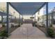 Inviting outdoor lounge area with covered seating and landscaped surroundings, perfect for relaxation at 610 E Roosevelt St # 145, Phoenix, AZ 85004