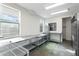 Bright storage area with stainless steel countertops, shelving and large windows at 610 E Roosevelt St # 145, Phoenix, AZ 85004