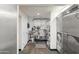 Large storage area with stainless steel sinks and large commercial refrigerator at 610 E Roosevelt St # 145, Phoenix, AZ 85004