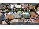 An aerial view shows a neighborhood with many homes with pools and solar panels on their roofs at 619 S Essex Ln, Mesa, AZ 85208