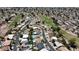 A high shot captures homes, pools and streets adjacent to the community golf course at 619 S Essex Ln, Mesa, AZ 85208