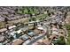 Neighborhood aerial view featuring community golf course, residential housing and a road at 619 S Essex Ln, Mesa, AZ 85208