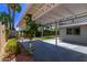 Covered patio with fan overlooking lush backyard at 619 S Essex Ln, Mesa, AZ 85208