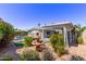 Secluded backyard with covered patio and water fountain at 619 S Essex Ln, Mesa, AZ 85208