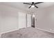 Neutrally painted bedroom with soft carpet and closet at 619 S Essex Ln, Mesa, AZ 85208