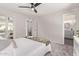 Comfortable bedroom with soft carpet and ensuite bath at 619 S Essex Ln, Mesa, AZ 85208