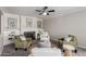 Bright living room with fireplace, open shelving, and comfortable seating at 619 S Essex Ln, Mesa, AZ 85208