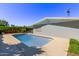 Inviting backyard pool with covered patio at 619 S Essex Ln, Mesa, AZ 85208