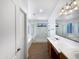 Bright bathroom with double vanity, soaking tub, and separate shower, offering a spa-like experience at 6255 S Opal Dr, Chandler, AZ 85249