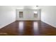 Spacious bedroom with neutral walls, hardwood floors, and natural light at 6255 S Opal Dr, Chandler, AZ 85249
