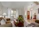 Comfortable living room with large windows, plush seating, and a warm, inviting atmosphere at 6446 E Beverly Ln, Scottsdale, AZ 85254