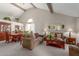Bright living room with vaulted ceilings, comfortable seating, and open floor plan at 6446 E Beverly Ln, Scottsdale, AZ 85254