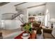Spacious living room featuring a staircase, open floor plan, and neutral color scheme at 6446 E Beverly Ln, Scottsdale, AZ 85254