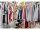 This walk-in closet provides ample storage and shelving for organization and convenience at 6446 E Beverly Ln, Scottsdale, AZ 85254