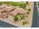Lovely aerial view shows the single-Gathering home, three car garage, and community golf course at 6931 S Four Peaks Way, Chandler, AZ 85249