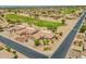 Beautiful aerial view showcases the single-Gathering home, golf course, neighborhood and surrounding desert landscape at 6931 S Four Peaks Way, Chandler, AZ 85249