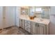 Bathroom featuring dual sinks and generous vanity space at 6931 S Four Peaks Way, Chandler, AZ 85249