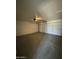 A clean garage with a working door at 808 N 67Th Ln, Phoenix, AZ 85043