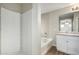 Bathroom with a tub-shower combination, a white shower curtain, and a vanity with light countertop at 822 E Agua Fria Ln, Avondale, AZ 85323