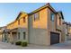 Stylish two-story residence featuring a tiled roof and well-maintained desert landscaping at 822 E Agua Fria Ln, Avondale, AZ 85323